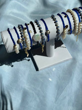 Load image into Gallery viewer, Beaded bracelets with pearls, gold details and blue beads