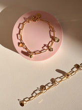 Load image into Gallery viewer, Gold plated bracelet for woman with clip chain and our charms: angel, heart, flower and bell