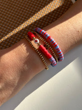 Load image into Gallery viewer, Red and denim bracelets with heishi beads. Combined with gold elastic bracelet