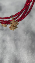 Load and play video in Gallery viewer, Red Necklace With Snowflake Pendant