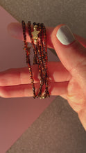 Load and play video in Gallery viewer, Bracelet With Gold Plated Star And Bronze Beads
