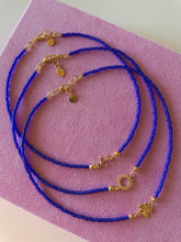 Load image into Gallery viewer, Blue beaded necklaces with gold-plated 925 silver connectors: flower, or anchor or sun
