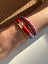 Load image into Gallery viewer, Red and denim bracelets with heishi beads. Combined with gold elastic bracelet
