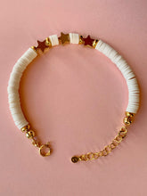 Load image into Gallery viewer, Bracelet With White Heishi Beads And Gold Plated Stars - Jeleja
