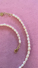 Load and play video in Gallery viewer, Bow Necklace With Pearls
