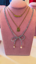 Load and play video in Gallery viewer, Bow Necklace With Beads
