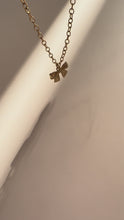 Load and play video in Gallery viewer, Necklace With Bow Pendant
