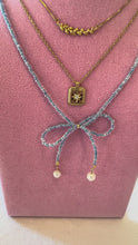 Load and play video in Gallery viewer, Bow Necklace With Beads
